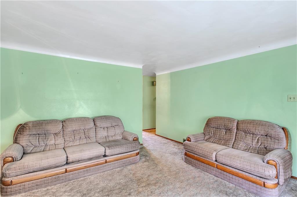 156 Wendel Road Herminie, PA 15637 - Photo 12 of 25 a living room with furniture and a couch