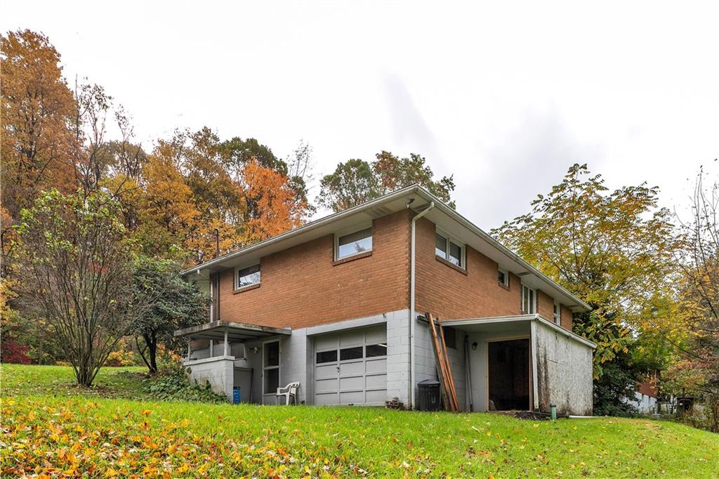156 Wendel Road Herminie, PA 15637 - Photo 6 of 25 a view of a house with a yard