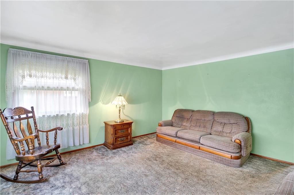 156 Wendel Road Herminie, PA 15637 - Photo 10 of 25 a living room with furniture and a window
