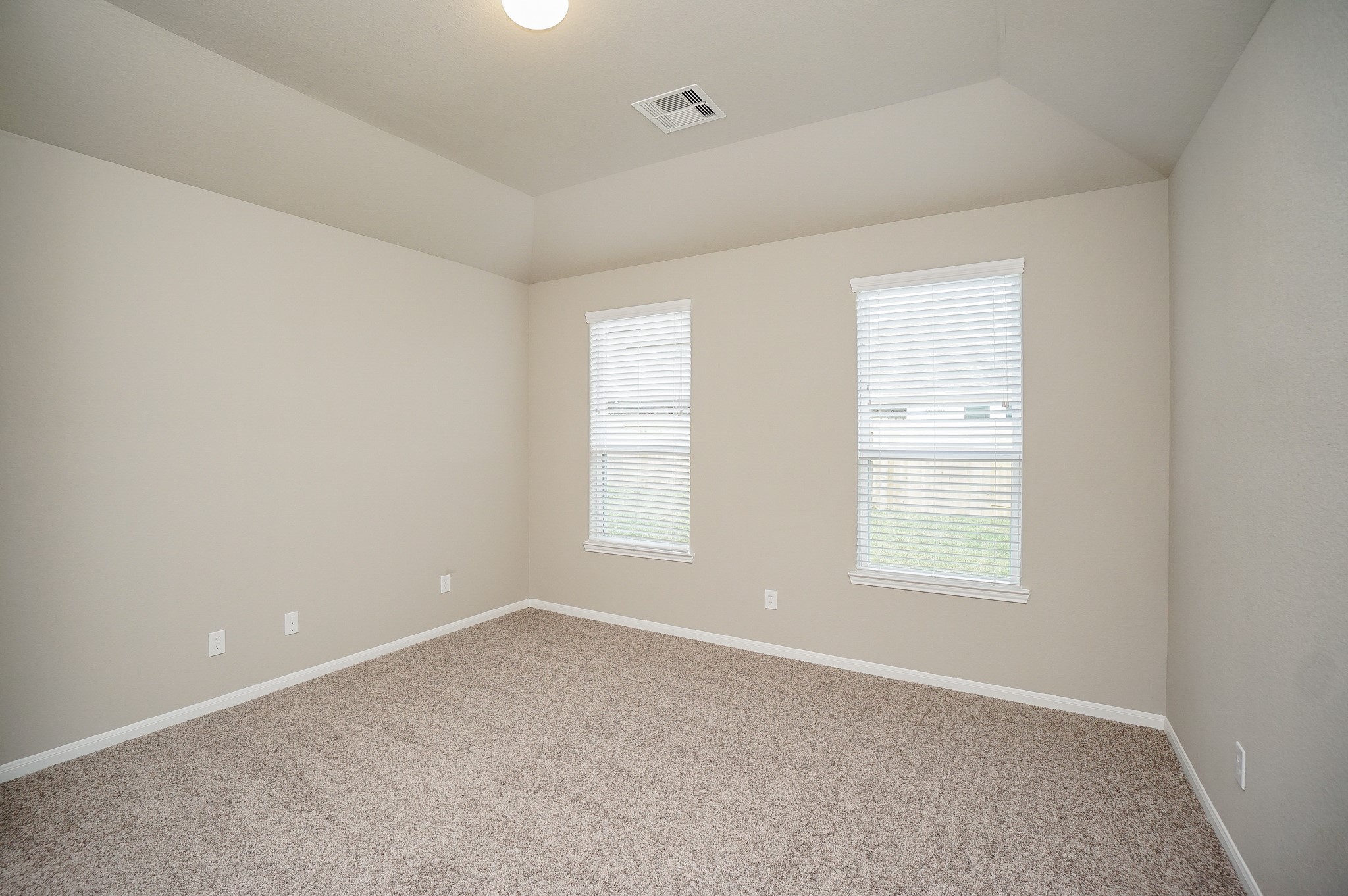 5463 Grand View Drive Fulshear, TX 77423 - Photo 15 of 32 an empty room with windows