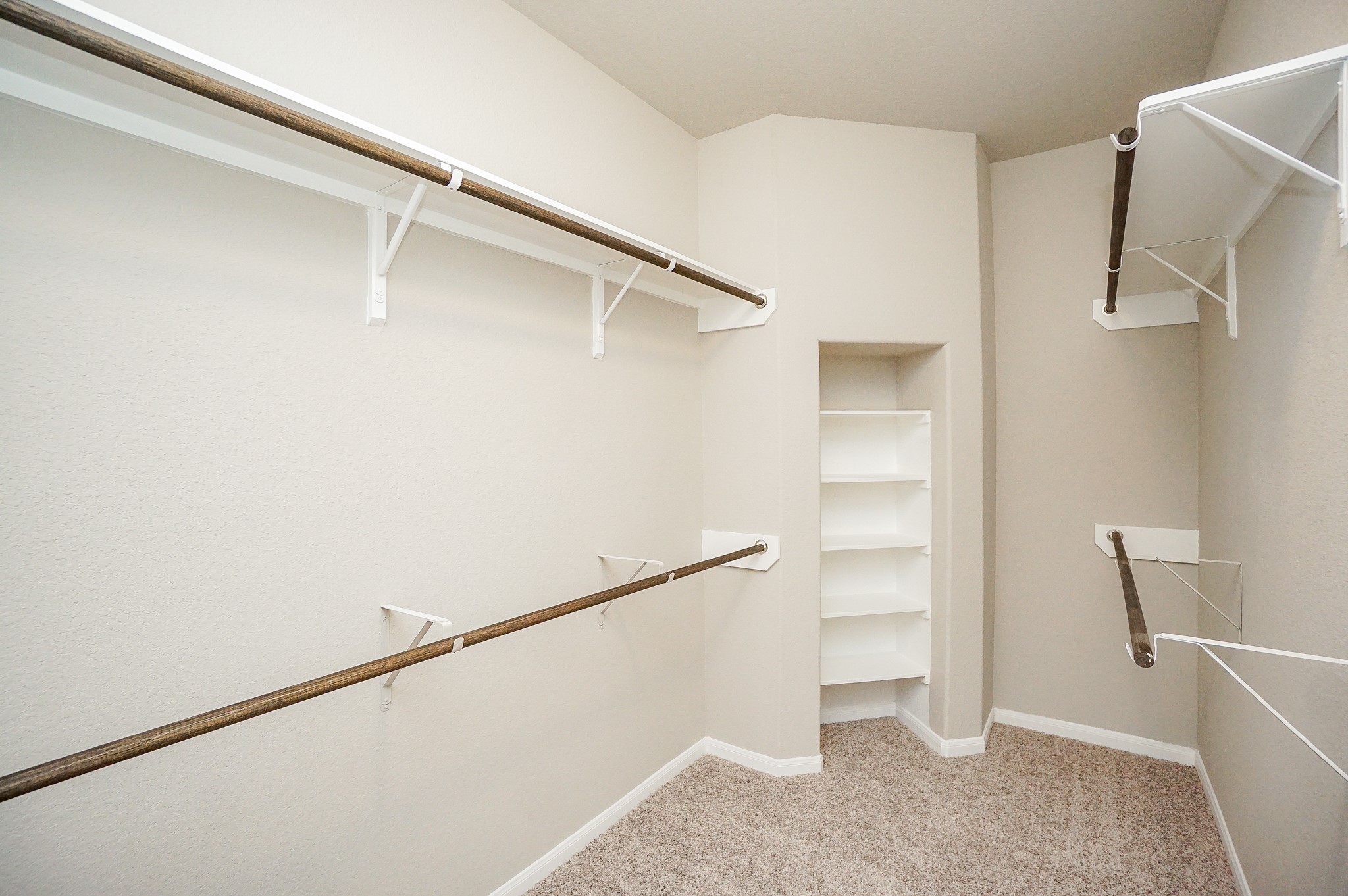 5463 Grand View Drive Fulshear, TX 77423 - Photo 18 of 32 a view of an empty walk in closet