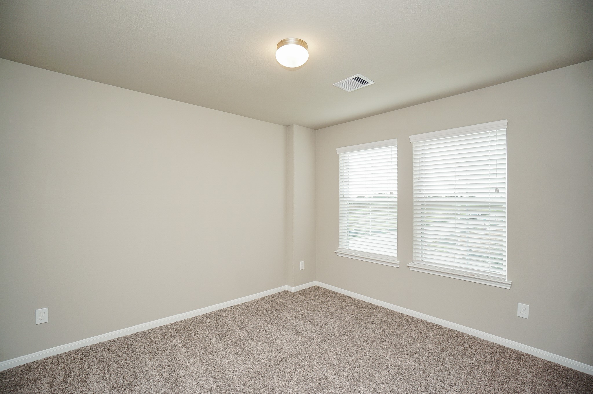 5463 Grand View Drive Fulshear, TX 77423 - Photo 20 of 32 a view of an empty room with a window