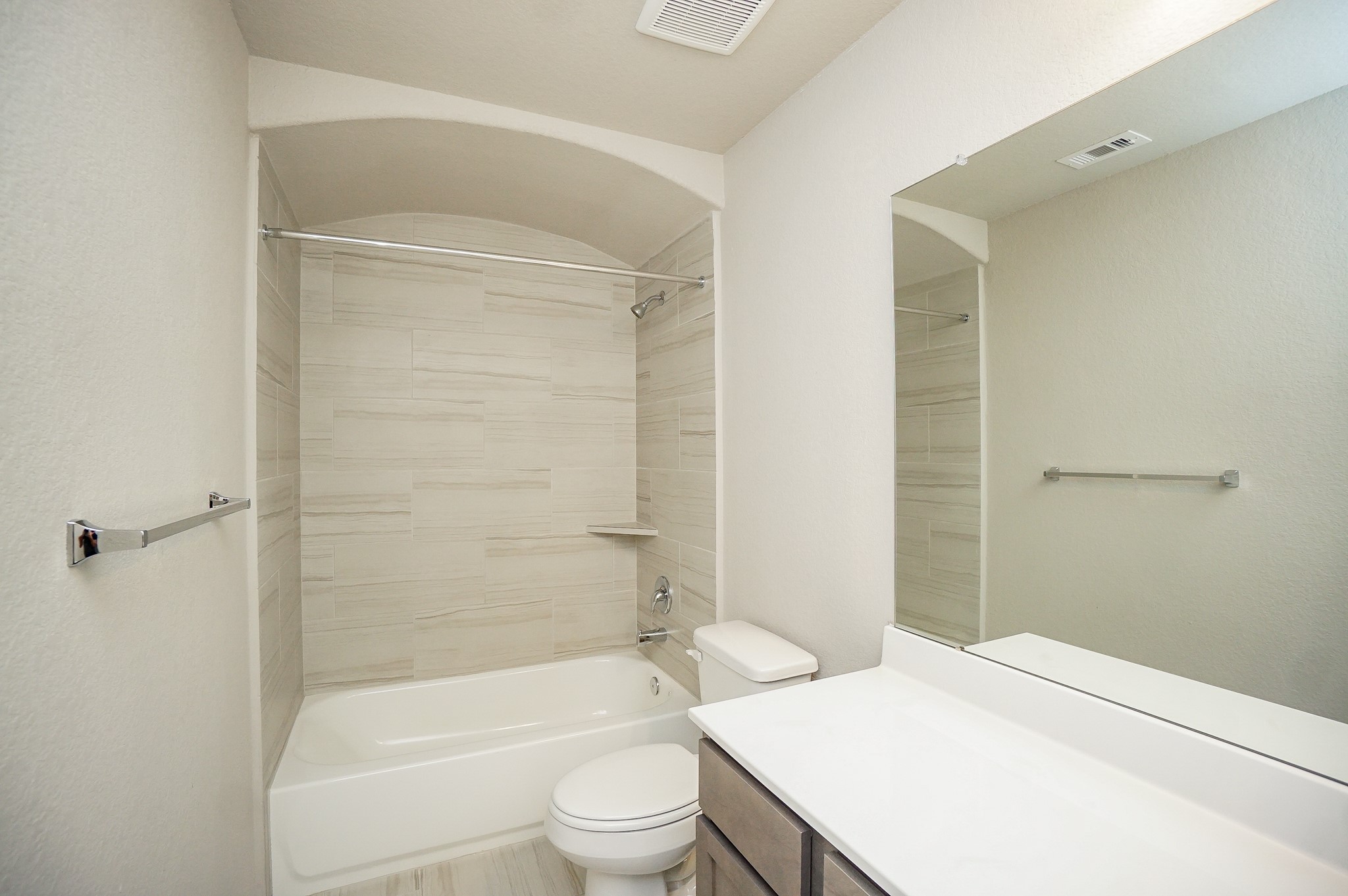 5463 Grand View Drive Fulshear, TX 77423 - Photo 23 of 32 a bathroom with a sink a toilet and shower