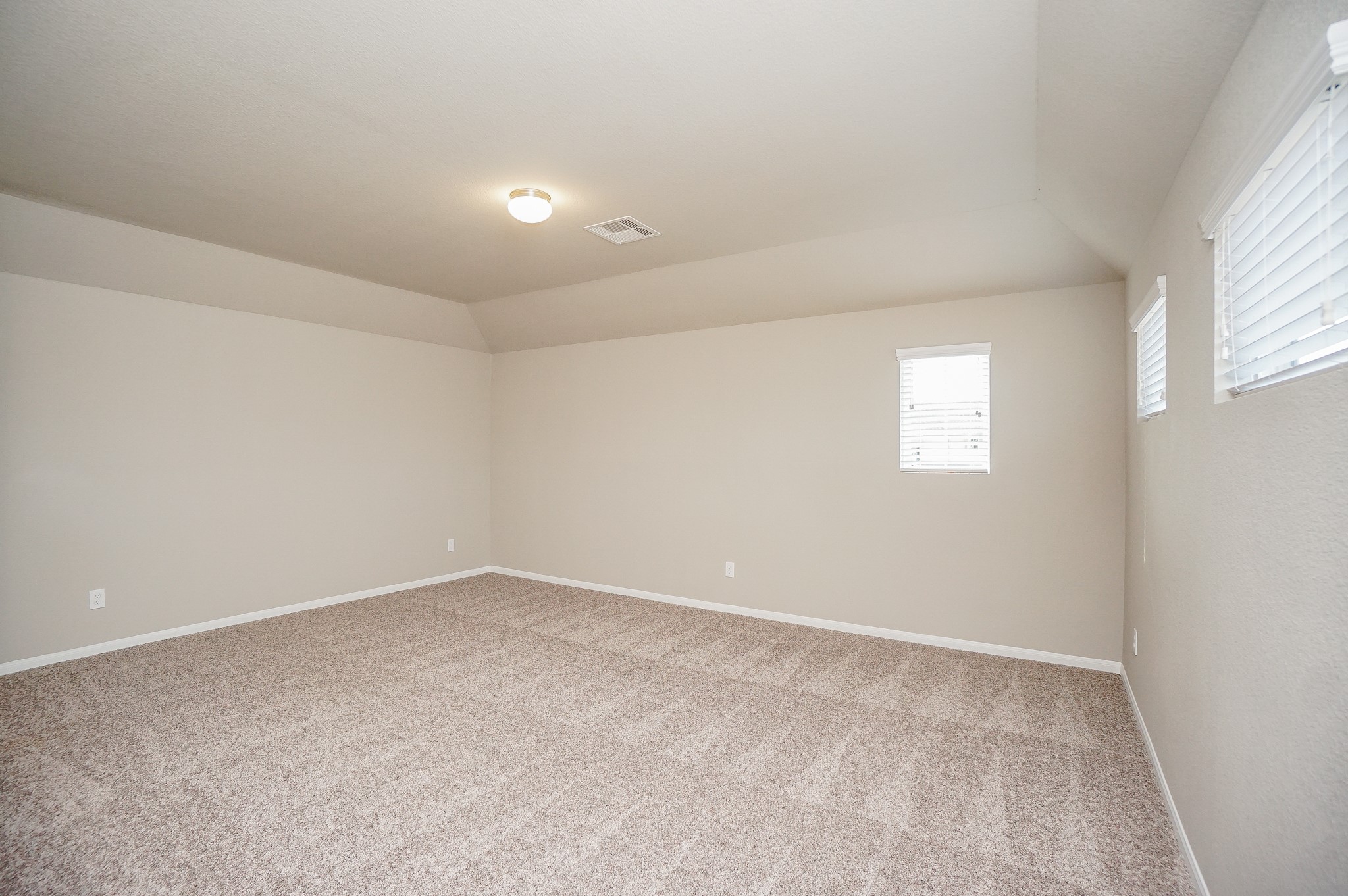 5463 Grand View Drive Fulshear, TX 77423 - Photo 29 of 32 an empty room with windows