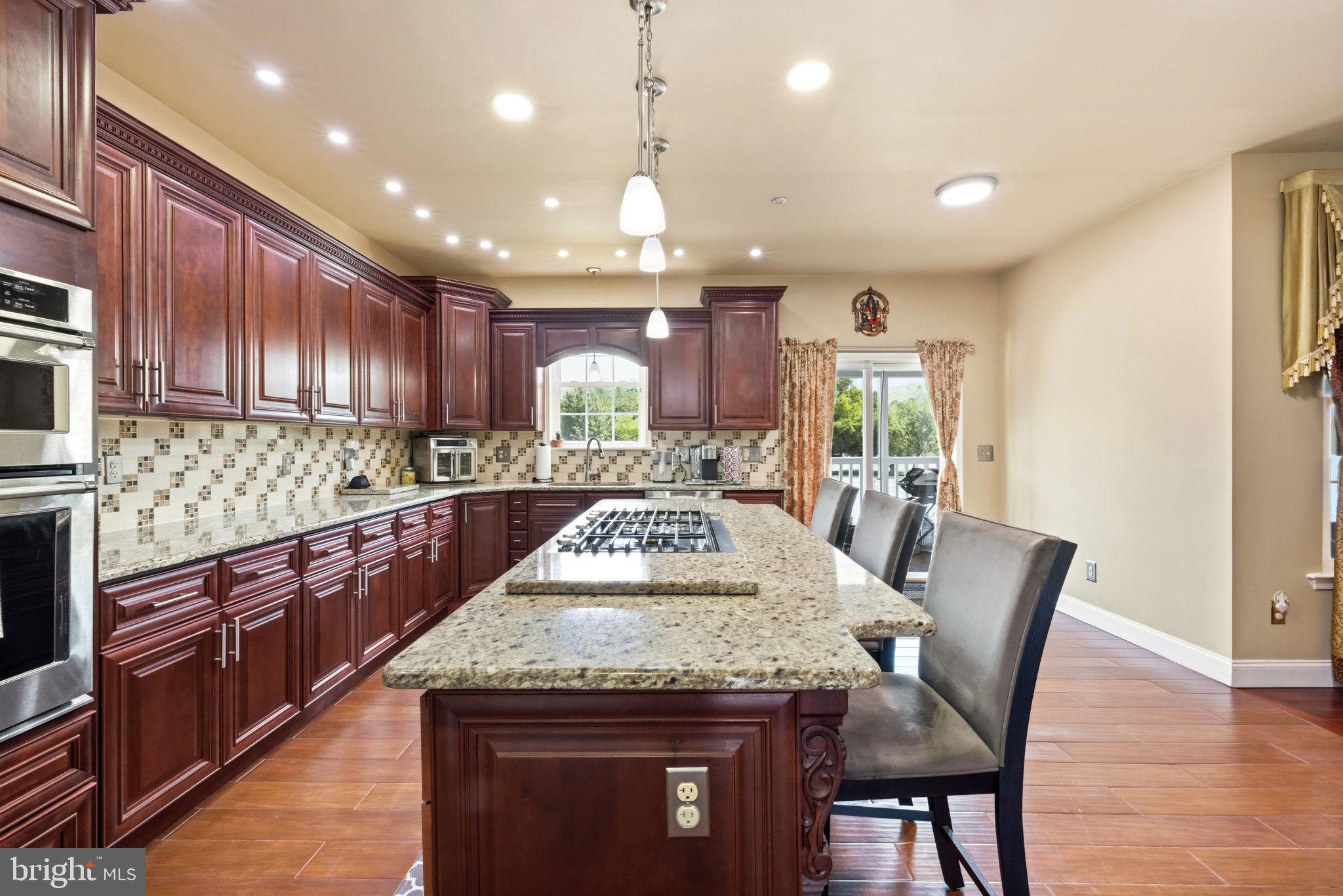 17 Paddock Road Marlton, NJ 08053 - Photo 11 of 54 Elegant kitchen with rich cabinetry.