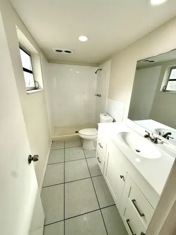 a bathroom with a bath tub