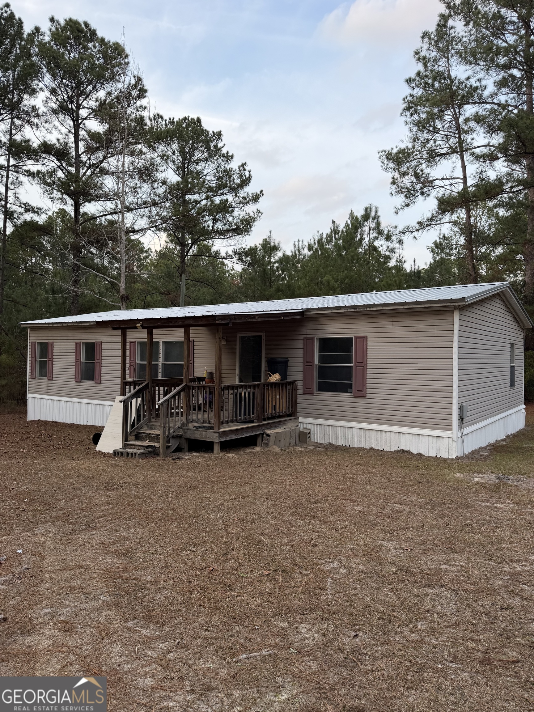 640 Beasley Road Cadwell, GA 31009 - Photo 1 of 6 front view of a house with yard
