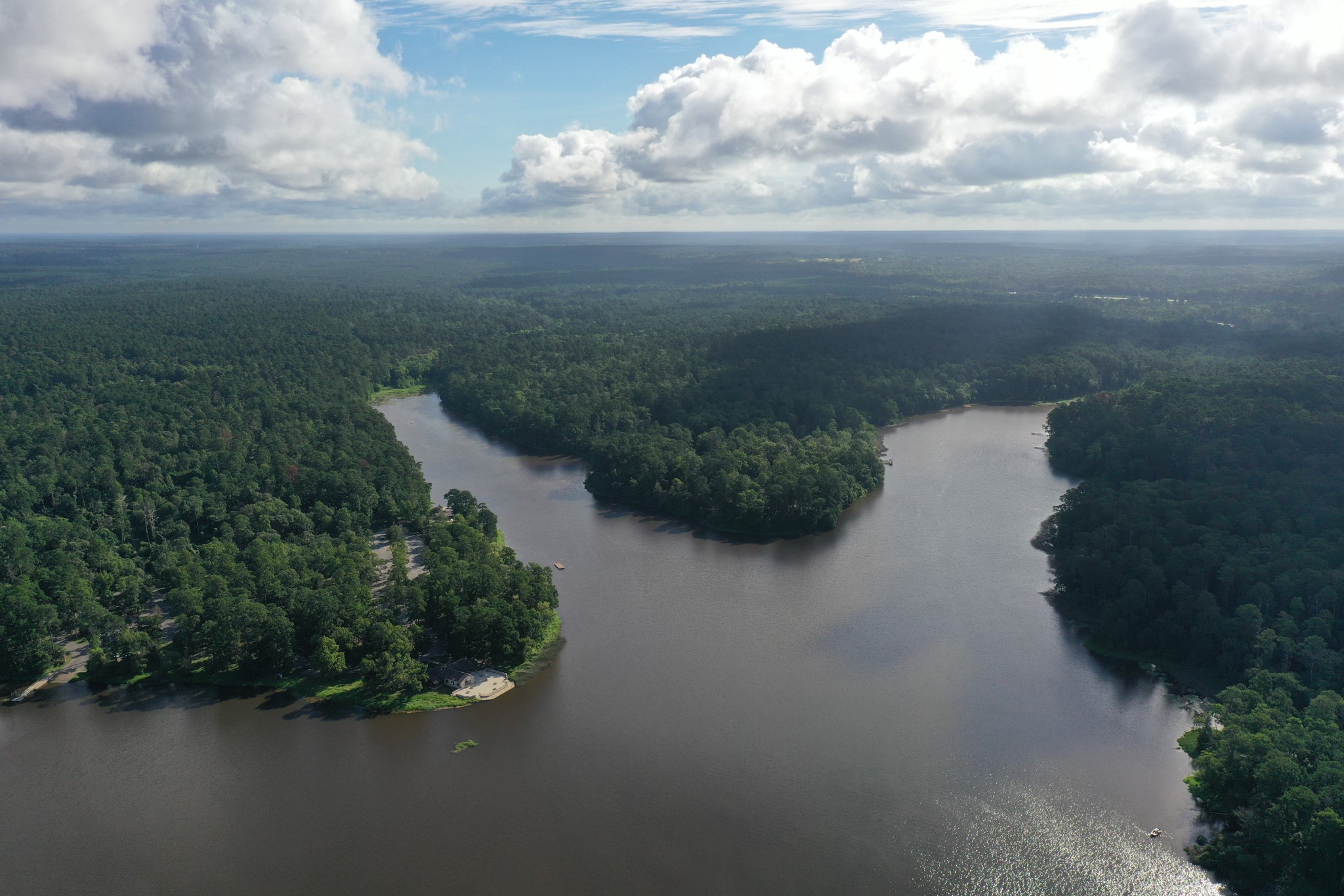 5-23-14 Rim Rock Road Huntsville, TX 77340 - Photo 25 of 45 Experience the best of nature and privacy with this stunning 3.73-acre wooded lot in the highly sought-after Texas Grand Ranch community. Nestled on Rim Rock Road and backing up to Huntsville State Park, this property offers direct access to scenic trails and abundant wildlife, creating the perfect setting for your dream home. Enjoy the tranquility of towering trees and paved roads while remaining just minutes from shopping, dining, and markets, with easy access to I-45 for a smooth commute. Zoned to Huntsv