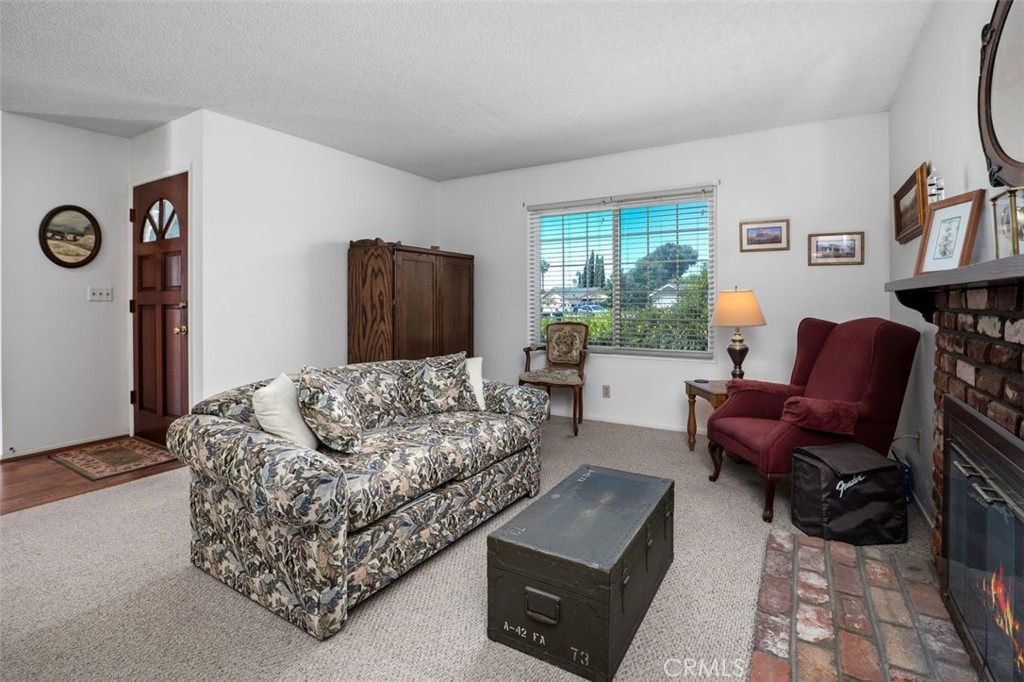 2233 East Everett Place Orange, CA 92867 - Photo 11 of 40 a living room with furniture and a window