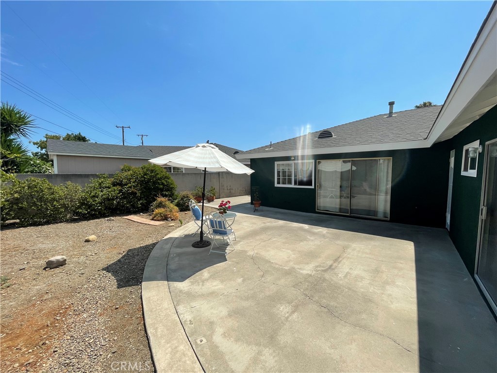 2233 East Everett Place Orange, CA 92867 - Photo 32 of 40 a view of a house with backyard and sitting area