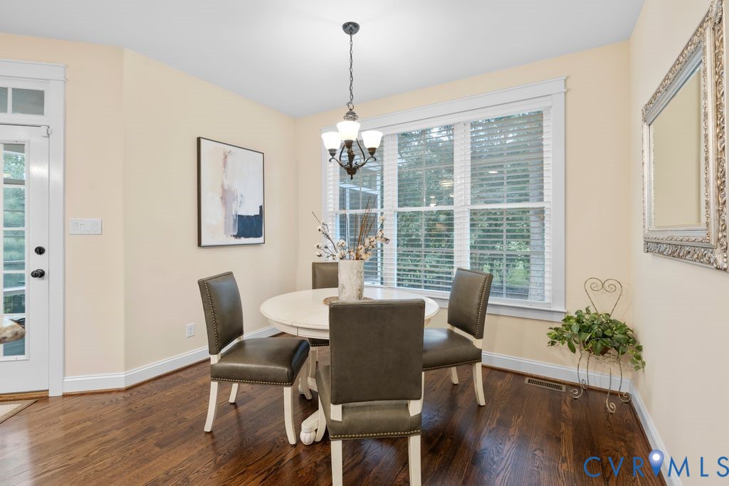 11518 Barrows Ridge Lane Chesterfield, VA 23838 - Photo 14 of 41 a view of a dining room with furniture window and wooden floor