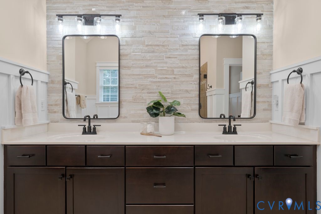 11518 Barrows Ridge Lane Chesterfield, VA 23838 - Photo 18 of 41 a bathroom with double vanity sinks and a mirror