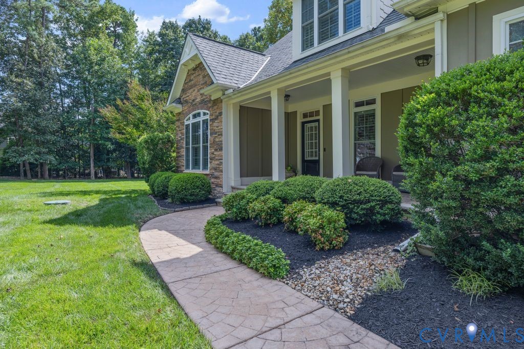 11518 Barrows Ridge Lane Chesterfield, VA 23838 - Photo 2 of 41 a view of a house with garden and yard