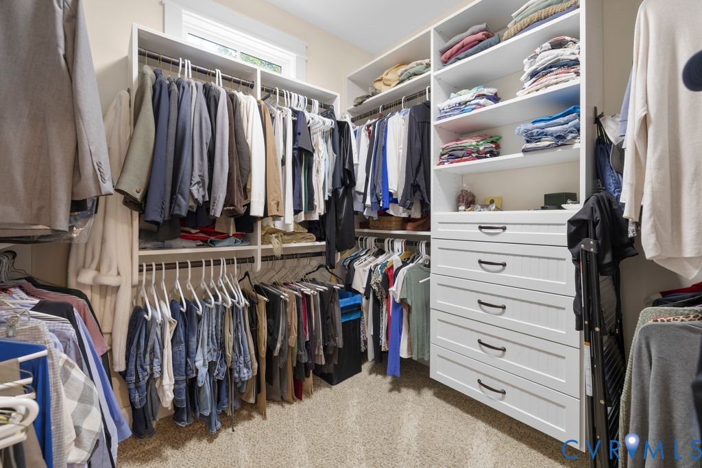 11518 Barrows Ridge Lane Chesterfield, VA 23838 - Photo 21 of 41 a view of walk in closet with clothes and shoes