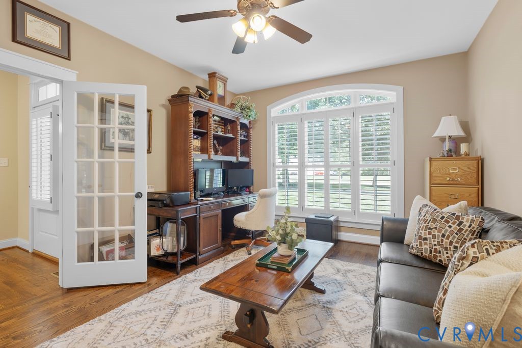11518 Barrows Ridge Lane Chesterfield, VA 23838 - Photo 22 of 41 a living room with furniture and a window
