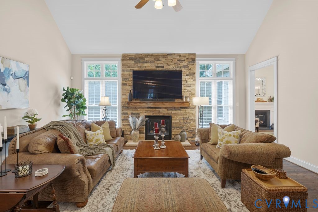 11518 Barrows Ridge Lane Chesterfield, VA 23838 - Photo 23 of 41 a living room with furniture and a fireplace