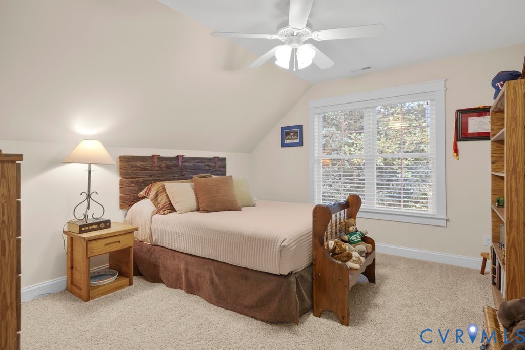 11518 Barrows Ridge Lane Chesterfield, VA 23838 - Photo 27 of 41 a bedroom with a bed and a window