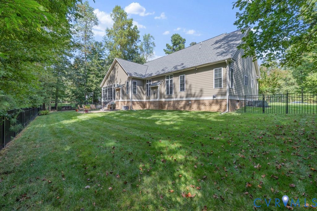 11518 Barrows Ridge Lane Chesterfield, VA 23838 - Photo 37 of 41 a view of a house with a yard and sitting area