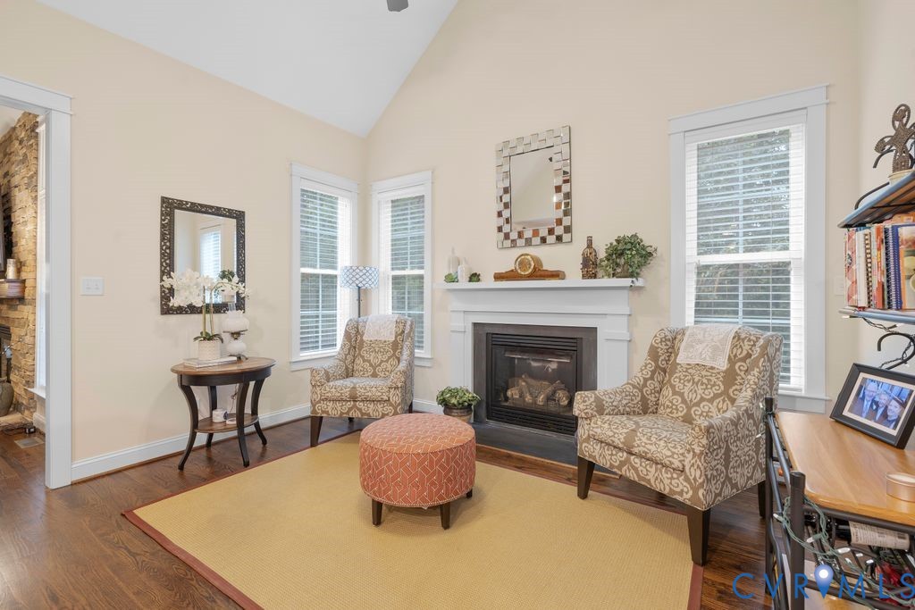11518 Barrows Ridge Lane Chesterfield, VA 23838 - Photo 9 of 41 a living room with furniture and a fireplace