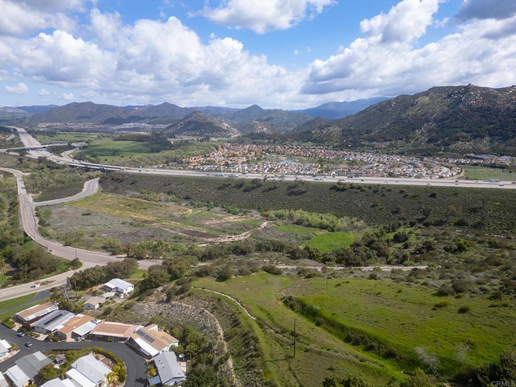 3309 San Rey Lane Bonsall, CA 92003 - Photo 4 of 16 a view of lake with mountain