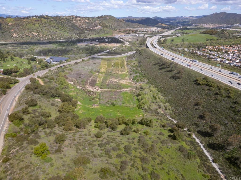 3309 San Rey Lane Bonsall, CA 92003 - Photo 6 of 16 a view of a lake with a mountain