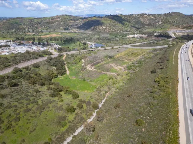 a view of a yard in front of a house