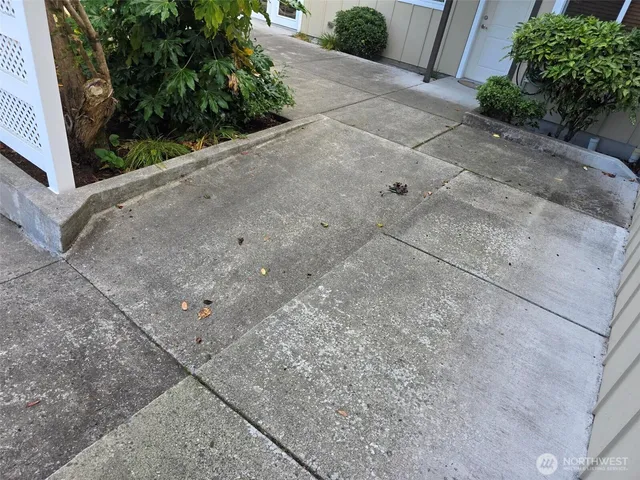 a view of a room with wooden walls