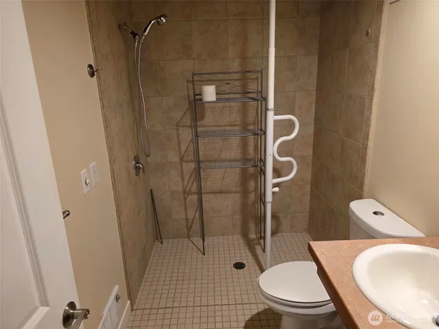 a view of white house with a yard