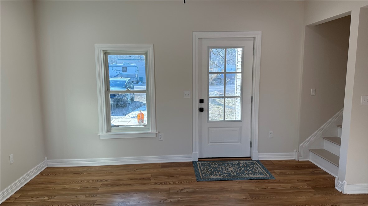 1667 Quaker Road Somerset, NY 14012 - Photo 8 of 29 View from Kitchen into Family Room and Front Door