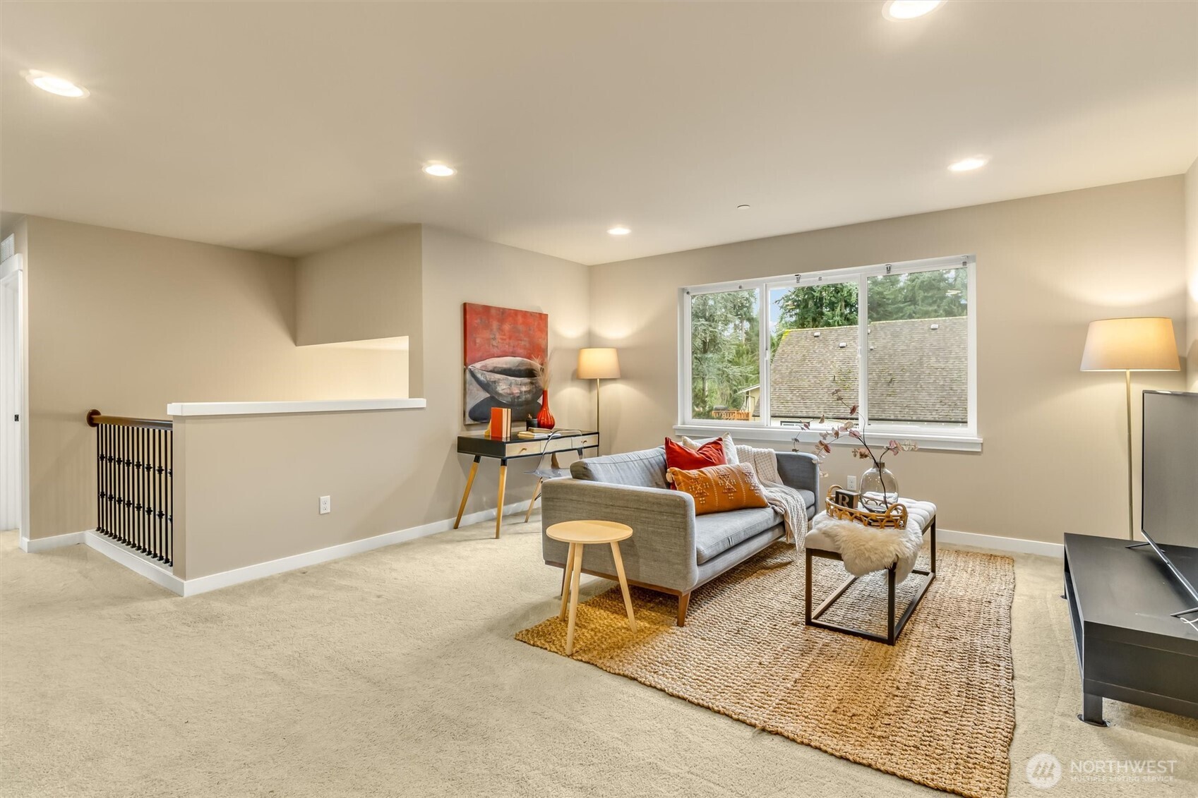 21707 2nd Avenue Southeast Bothell, WA 98021 - Photo 18 of 37 a living room with furniture and a large window