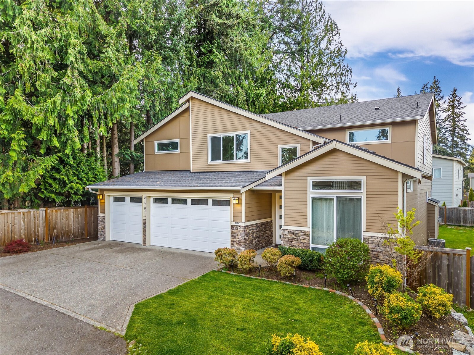21707 2nd Avenue Southeast Bothell, WA 98021 - Photo 2 of 37 front view of a house with a yard