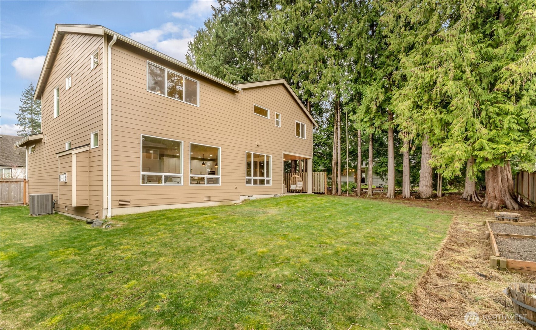 21707 2nd Avenue Southeast Bothell, WA 98021 - Photo 31 of 37 a front view of a house with a yard