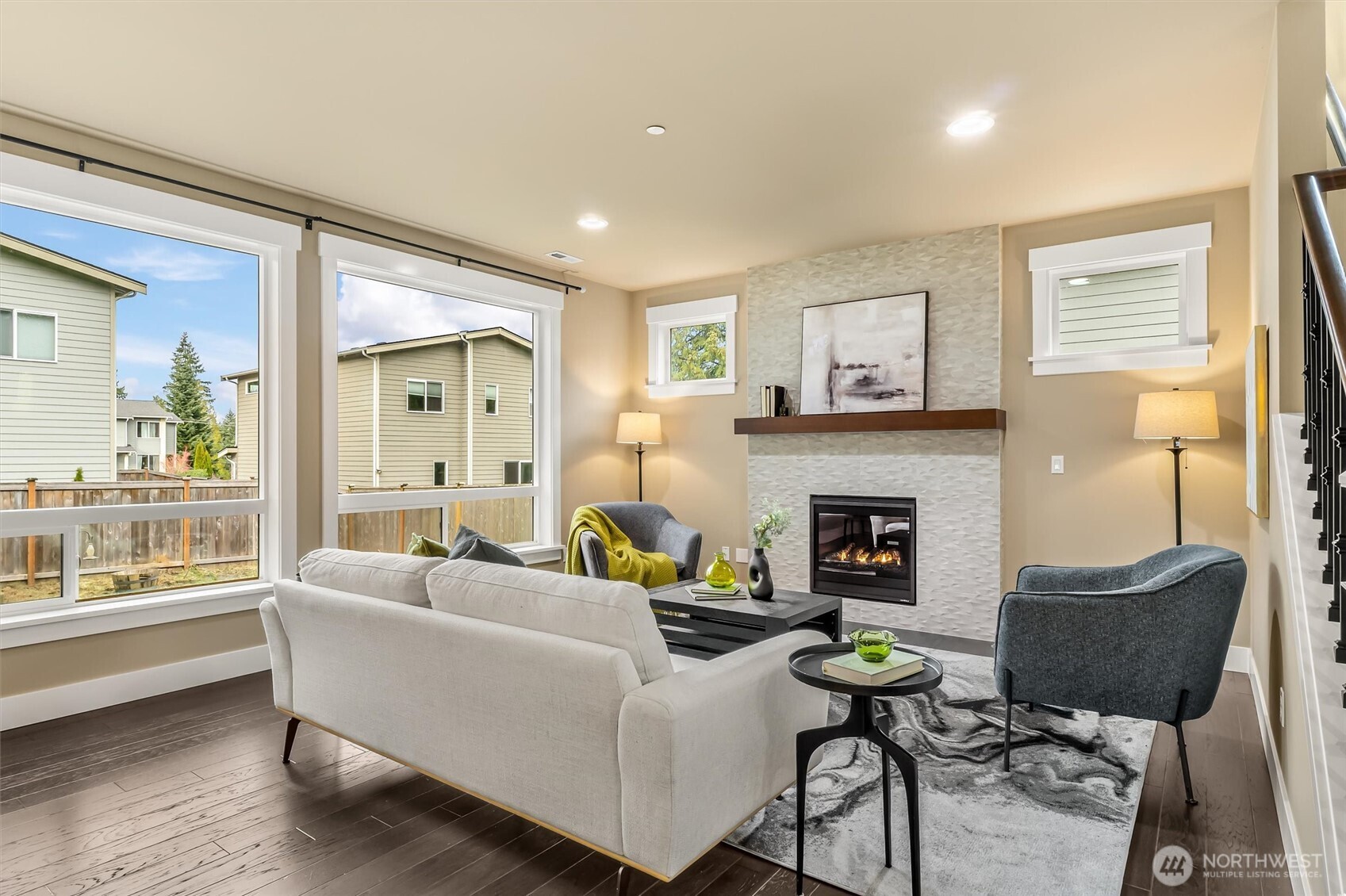 21707 2nd Avenue Southeast Bothell, WA 98021 - Photo 5 of 37 a living room with furniture and a fireplace