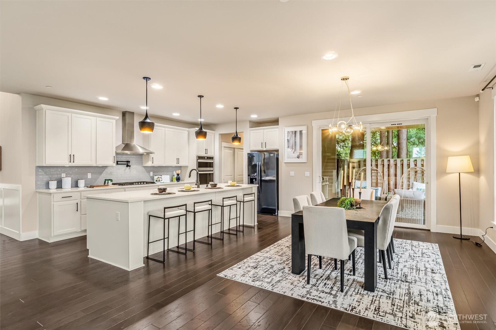 21707 2nd Avenue Southeast Bothell, WA 98021 - Photo 8 of 37 a large kitchen with a table and chairs