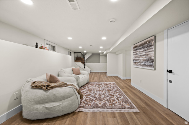 189 West Center Street Midvale, UT 84047 - Photo 31 of 64 Finished lower level with wood-finish flooring, recessed lighting, and white baseboards