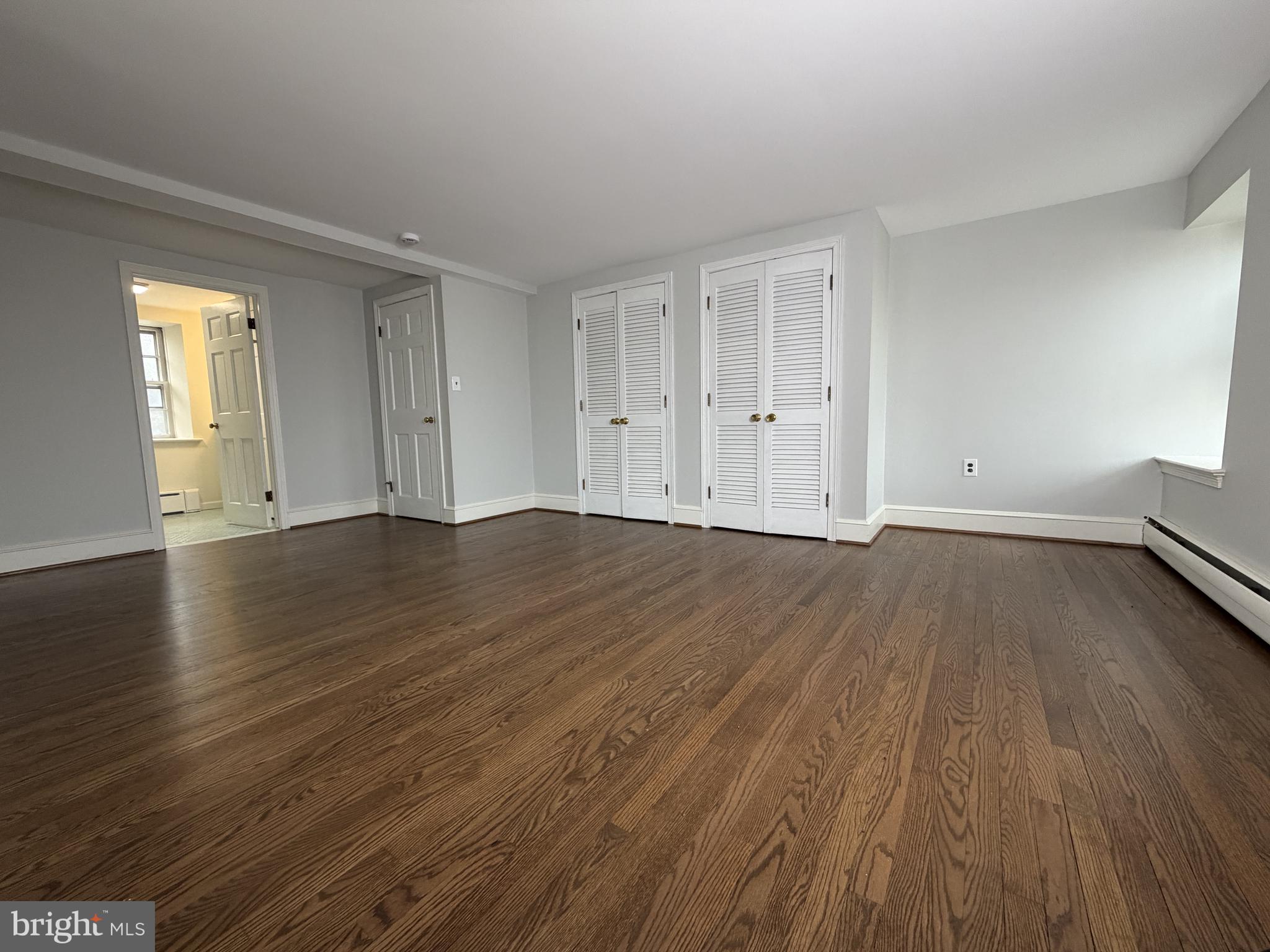 4700 Thompsons Bridge Road Wilmington, DE 19803 - Photo 22 of 41 a view of a room with wooden floor and window