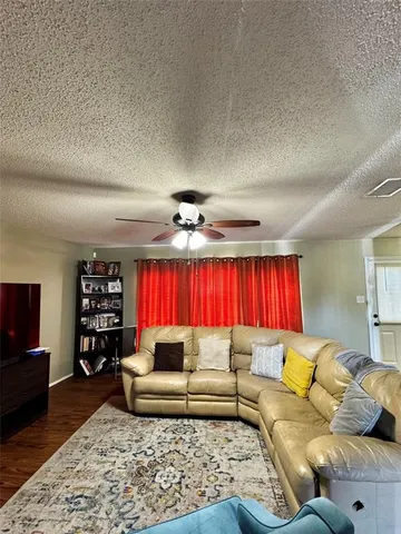 a living room with furniture and a couch