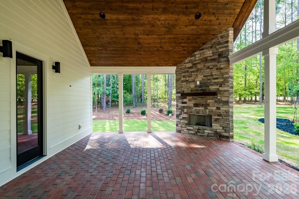 116 Silver Falls Road Troutman, NC 28166 - Photo 45 of 46 a house with garden in front of it