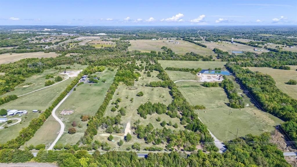 Tbd Baker Ridge Road Sherman, TX 75090 - Photo 3 of 26 an aerial view of a city with lots of residential buildings ocean and mountain view in back
