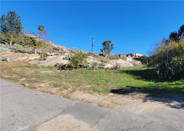 a view of a backyard of a house