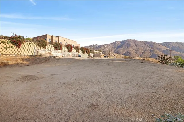 a view of ocean and a mountain