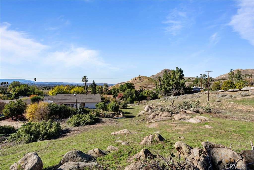 2935 Galaxie Heights Road Riverside, CA 92507 - Photo 22 of 35 a view of a lake with a mountain