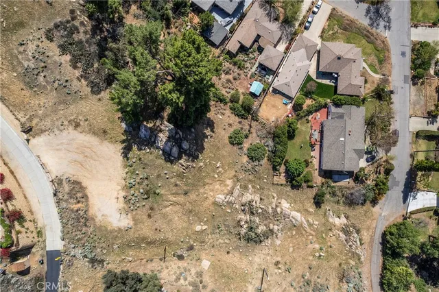 a aerial view of a house with a yard