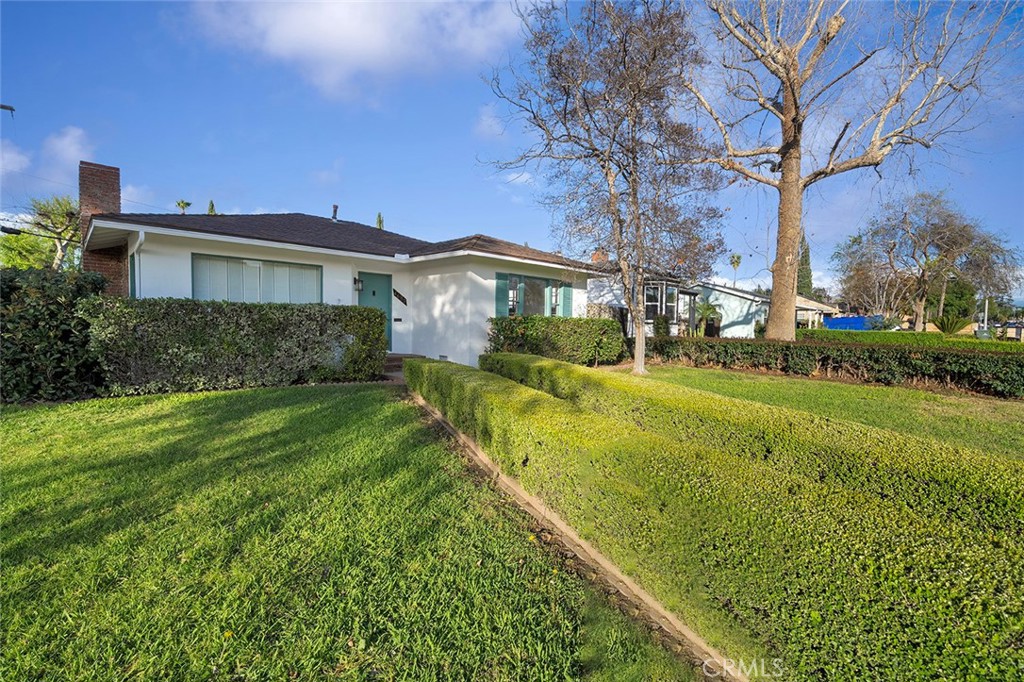 4693 Central Riverside, CA 92506 - Photo 2 of 31 a view of a house with a big yard