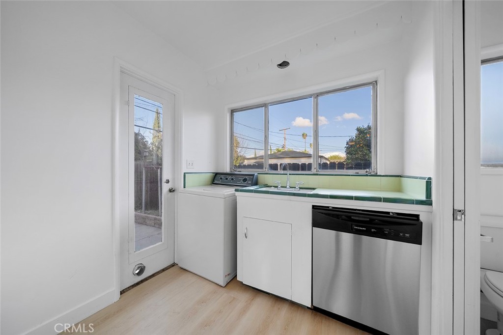4693 Central Riverside, CA 92506 - Photo 23 of 31 a kitchen with a sink and cabinets