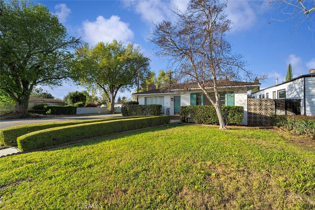 4693 Central Riverside, CA 92506 - Photo 3 of 31 a view of house with swimming pool outdoor seating