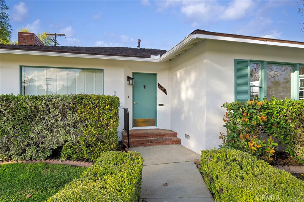 4693 Central Riverside, CA 92506 - Photo 5 of 31 a front view of a house with a yard