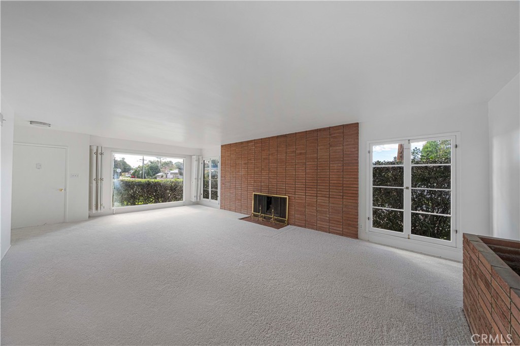 4693 Central Riverside, CA 92506 - Photo 6 of 31 a view of a livingroom with furniture and a fireplace