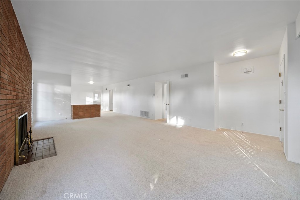 4693 Central Riverside, CA 92506 - Photo 9 of 31 a view of empty room with a kitchen