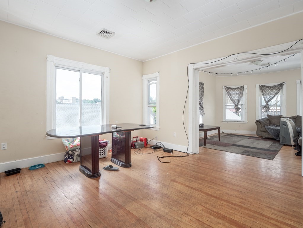 83 Canterbury Street Worcester, MA 01603 - Photo 20 of 42 a view of a livingroom with workspace and a window